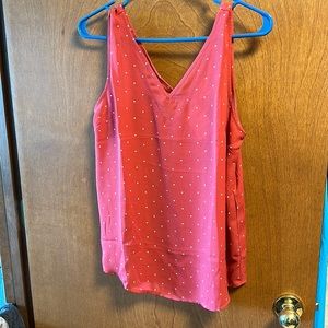 Cute little orange tank top.